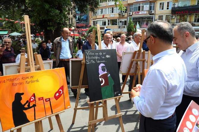 15-temmuz-milli-irade-ve-demokrasi-sergisi-tuzcuoglu-memisaga-parkinda-vatandaslarin-begenisine-sunuldu-(2).jpg