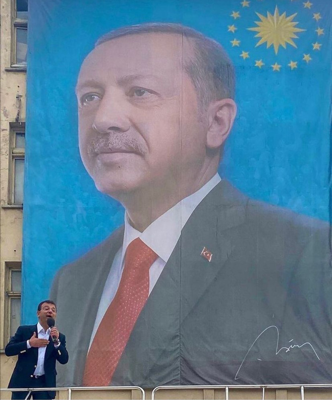 ekrem-imamoglu-rizenin-cayeli-ilcesinde-cumhurbaskani-erdoganin-dev-posterinin-onunde-konusma-yapti.jpg