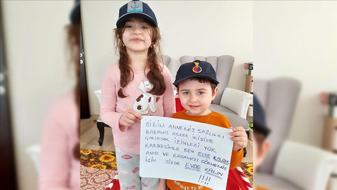 gorevdeki-anne-ve-babalarini-evde-bekleyen-cocuklardan-herkese-evde-kalin-cagrisi-2.jpg