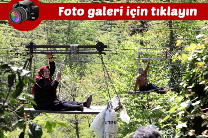 rizenin-daginiksu-mahallesinde-4-aile-ve-arazi-sahipleri-yol-olmadigi-icin-aracla-gidilemeyen-ev-ve-arazilerine-ilkel-yontemlerle-kurulan-teleferikle-ulasiyor-001.jpg